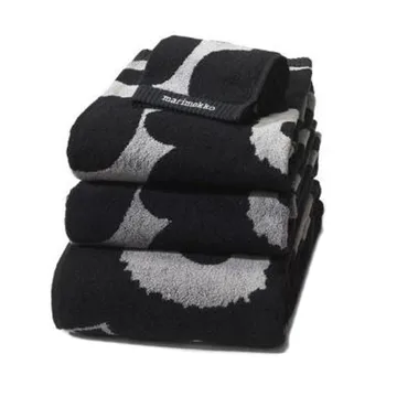Unikko pyyhe musta hiekanvärinen - käsipyyhe - Marimekko