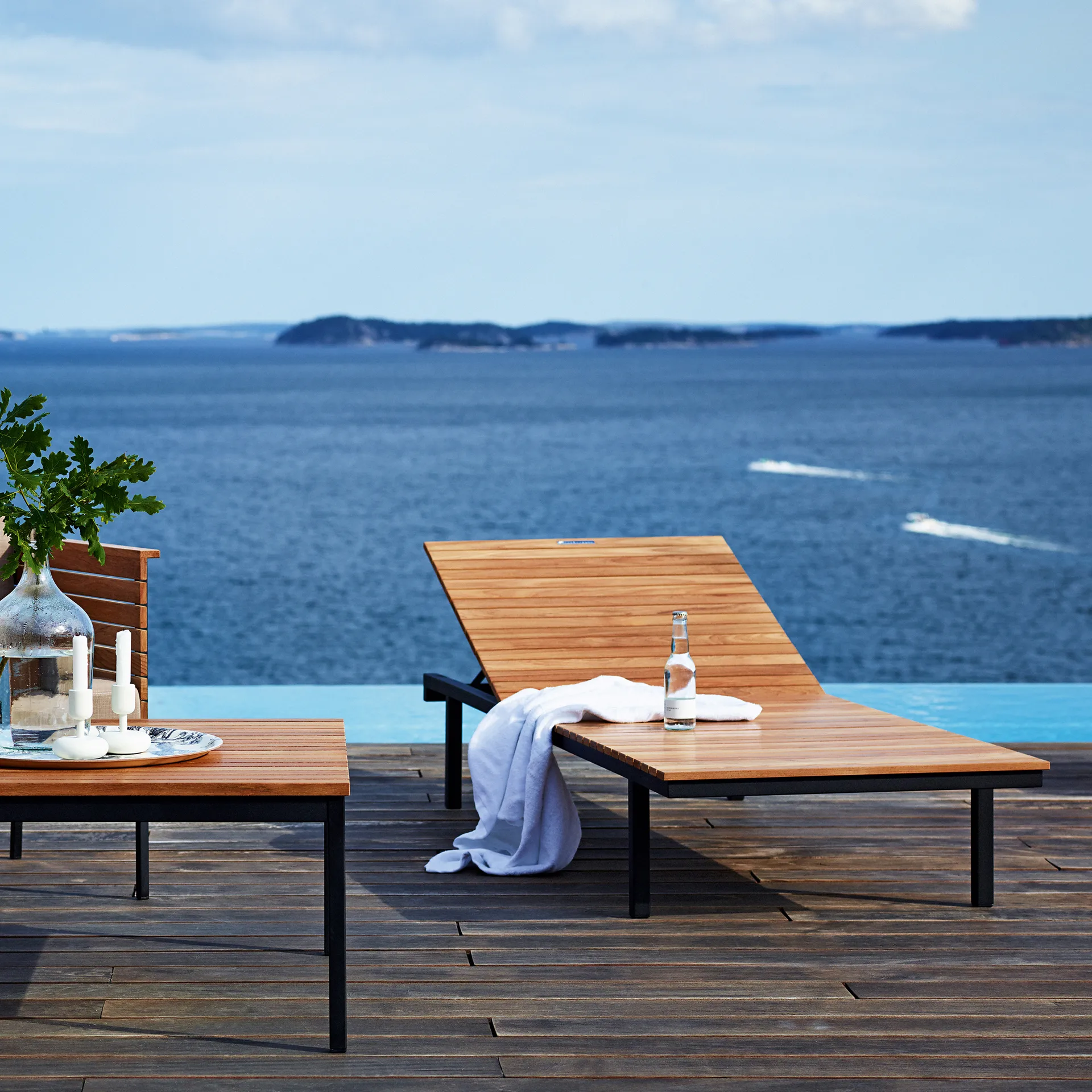 Häringe sohvapöytä, Tiikki, large, musta teräsrunko Skargaarden