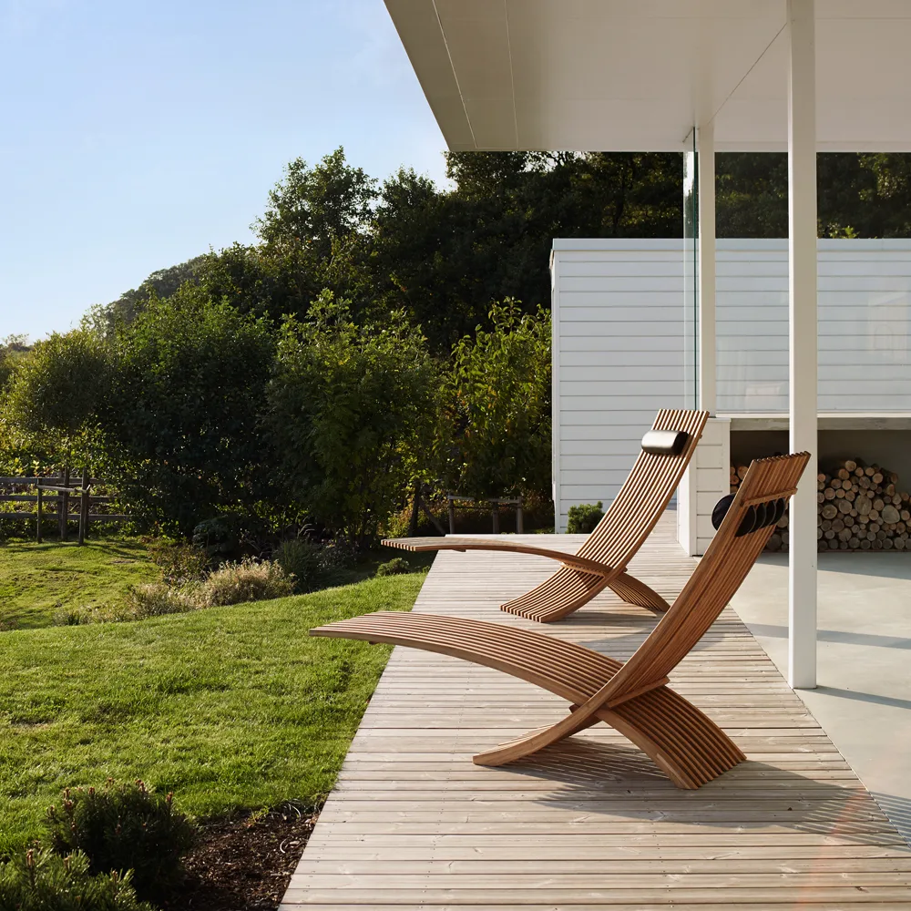 Nozib lepotuoli, Teak, musta nahkainen niskatuki Skargaarden