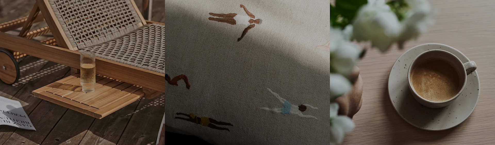 Aurinkotuoli juoman kanssa, kirjailtu tyyny uimareilla ja kahvikuppi valkoisten kukkien kera.